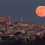 Luna che sorge su Monteverde e sottile Green Flash